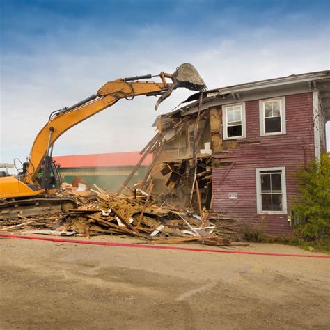 demo house with a skid steer back hoe bucket|House demo: Loader vs. Excavator .